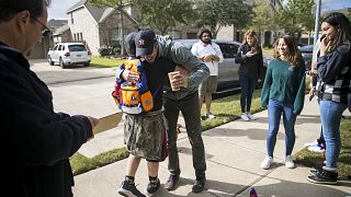 Beto O'Rourke greets a boy in Katy, Texas