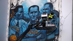 Image: Artist Solomon Souza paints the Holocaust Commemorative Mural at Sta