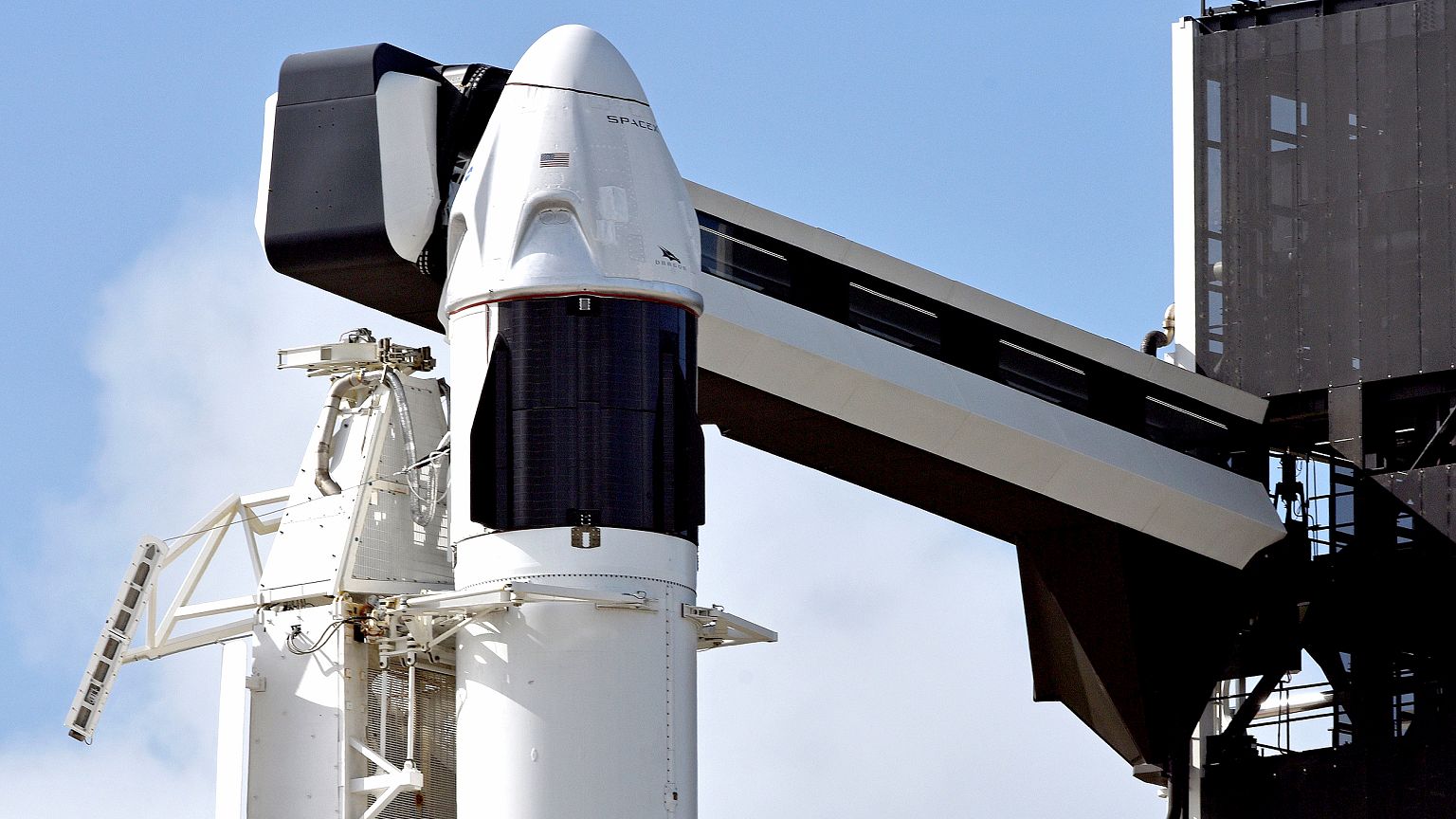 Image: The SpaceX Crew Dragon capsule sits atop a Falcon 9 booster rocket o