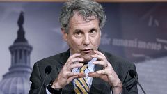 Image: Chuck Schumer, Ron Wyden, Sherrod Brown