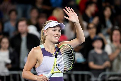 Denmark\'s Caroline Wozniacki celebrates after her victory against Kristie Ahn of the U.S. during their women\'s singles match on day one of the Australian Open tennis tournament in Melbourne on Jan. 20, 2020.
