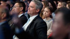 Image: Swedish climate activist Greta Thunberg listens to the speech of U.S