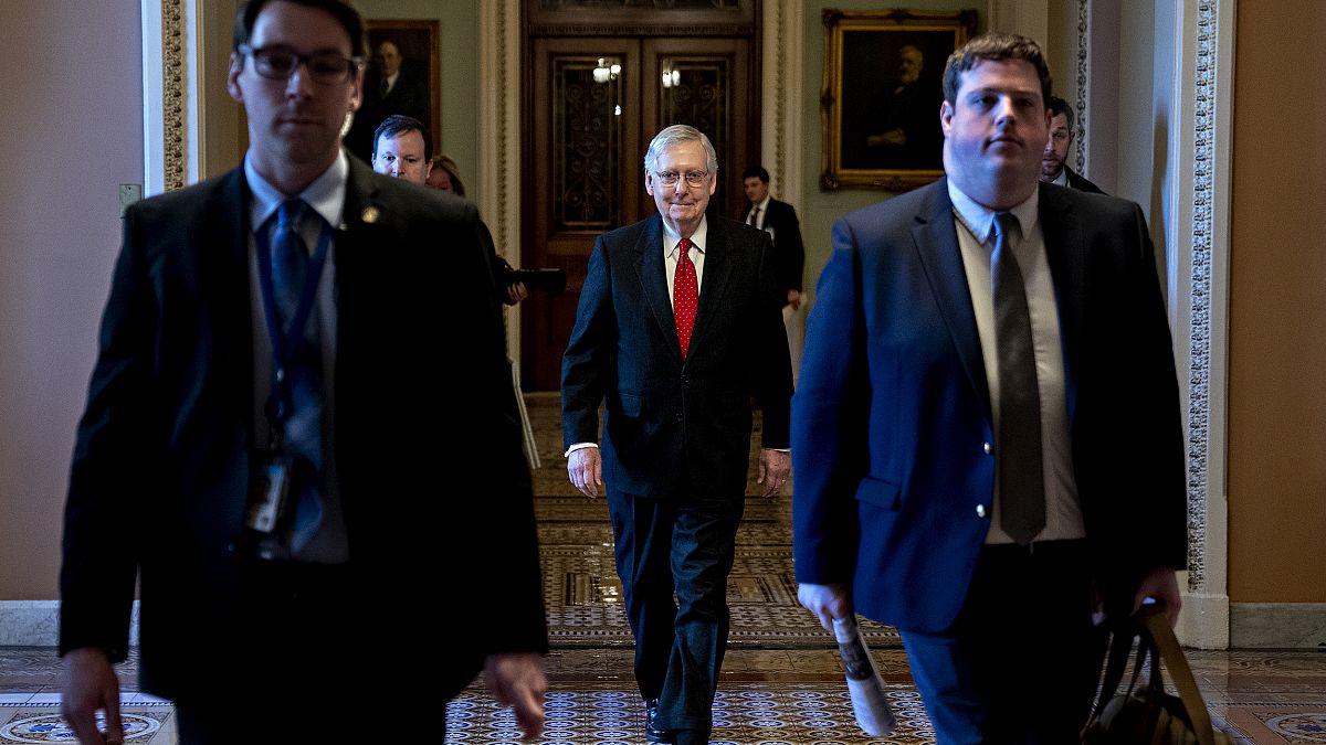 Senate Majority Leader Mitch McConnell arrives to the Capitol on Jan. 21, 2