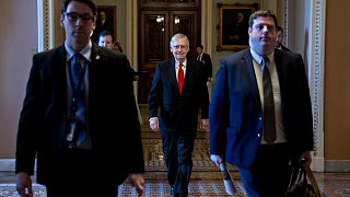 Senate Majority Leader Mitch McConnell arrives to the Capitol on Jan. 21, 2