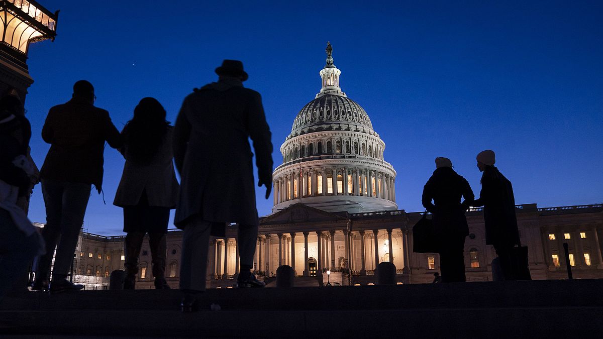 Image: Night falls on the Capitol, Wednesday evening, Jan. 22, 2020, during