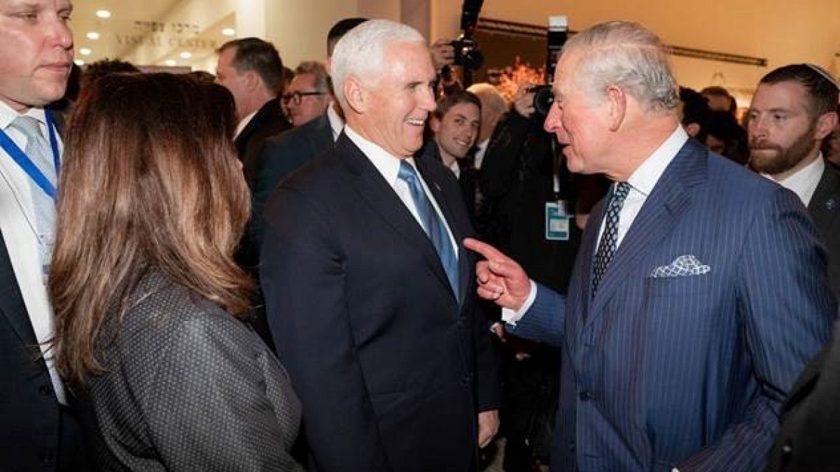 Vice President Mike Pence and Prince Charles talk before an event at the Ya