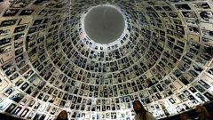 Image: Visitors look at the Hall of Names, a repository for the names of mi
