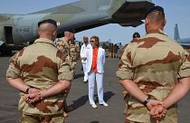 Image: French Minister of Army Forces Florence Parly stands meets French of
