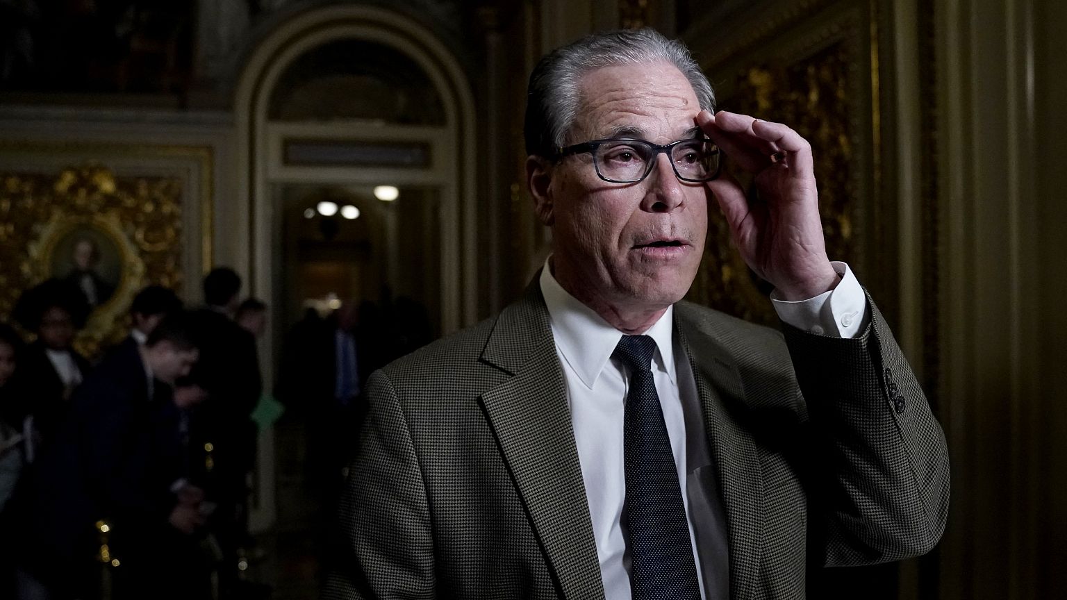 Image: Sen. Mike Braun, R-IN, speaks to reporters during an impeachment tri