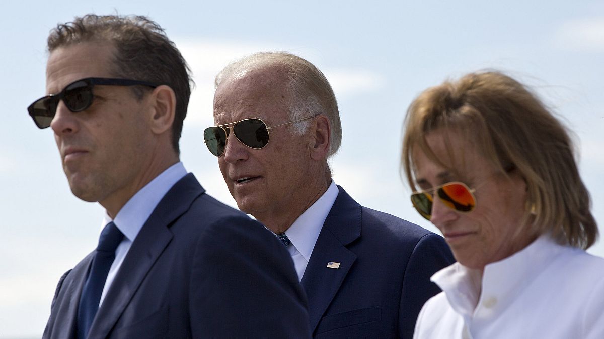 Image: U.S. Vice President Joe Biden, centre, his son Hunter Biden, left, a