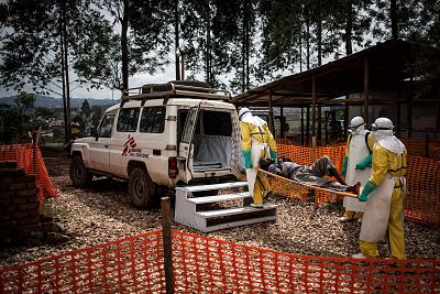 Health workers move a patient to a hospital after he was cleared of being infected with Ebola at a Doctors Without Borders treatment center in Butembo, Democratic Republic of Congo on Nov. 4, 2018.