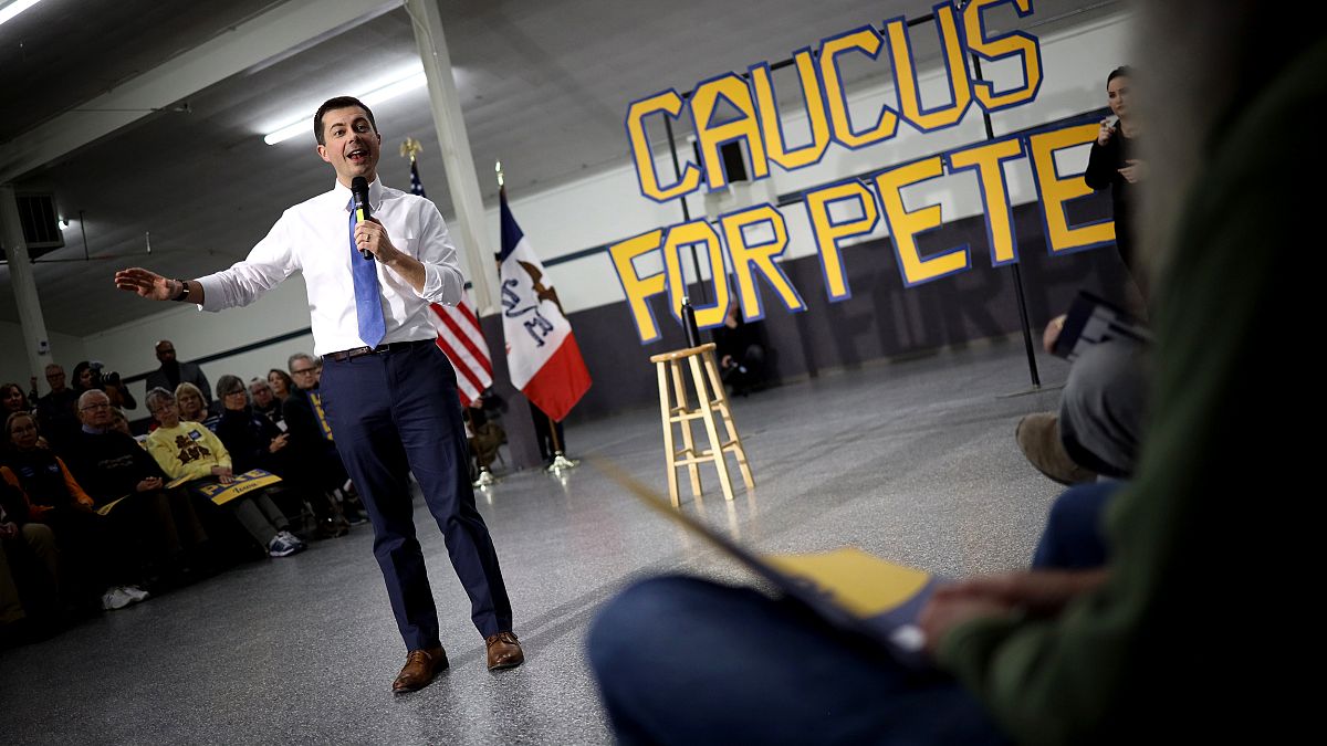 Image: Pete Buttigieg answers questions from voters during a town hall even