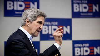 Image: John Kerry speaks at a campaign event for Joe Biden in Des Moines, I