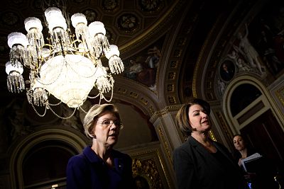 Sen. Elizabeth Warren, D-Mass., and Sen. Amy Klobuchar, D-Minn., arrive to the impeachment trial of President Donald Trump at the Capitol on Jan. 31, 2020.