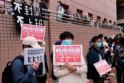 Medical workers hold a strike on Tuesday as they demand that Hong Kong closes its border with China to stop coronavirus spread.