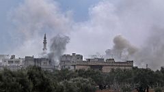Image: Smoke plumes billowing from bombardment by the Syrian government for