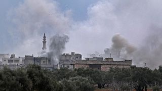 Image: Smoke plumes billowing from bombardment by the Syrian government for