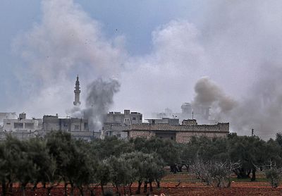 Smoke plumes billowing from bombardment by the Syrian government forces and allies on the town of Sarmin, southeast of the city of Idlib on Feb. 4, 2020.