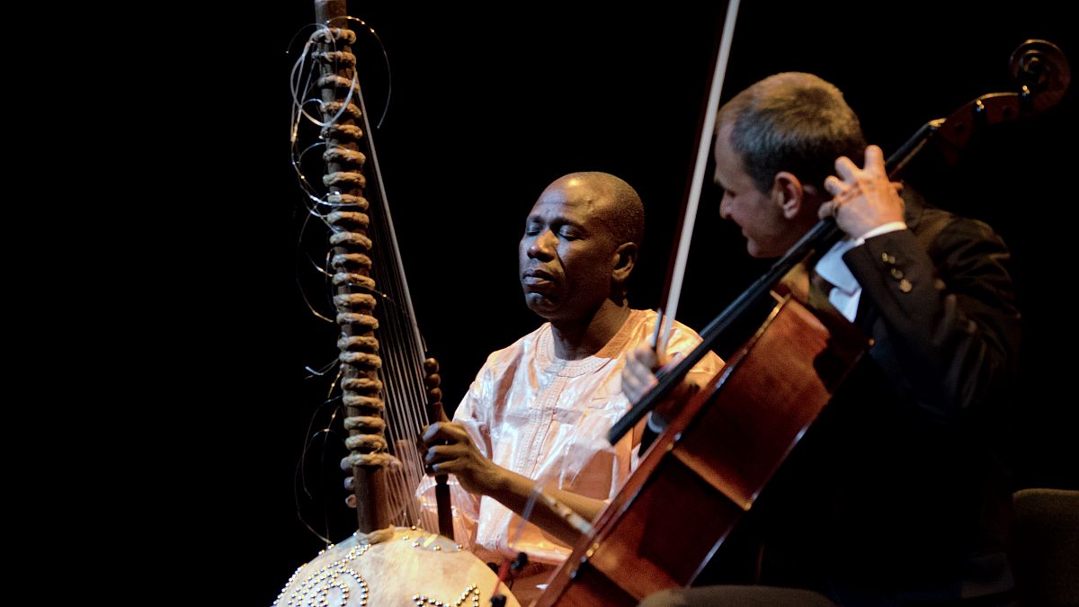 Image: Ballak? Sissoko, left, in concert in Paris on Sept. 9, 2015.
