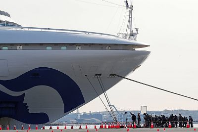 The cruise ship Diamond Princess next to a bridge at Daikoku Pier in Yokohama, south of Tokyo, Japan on Friday. 