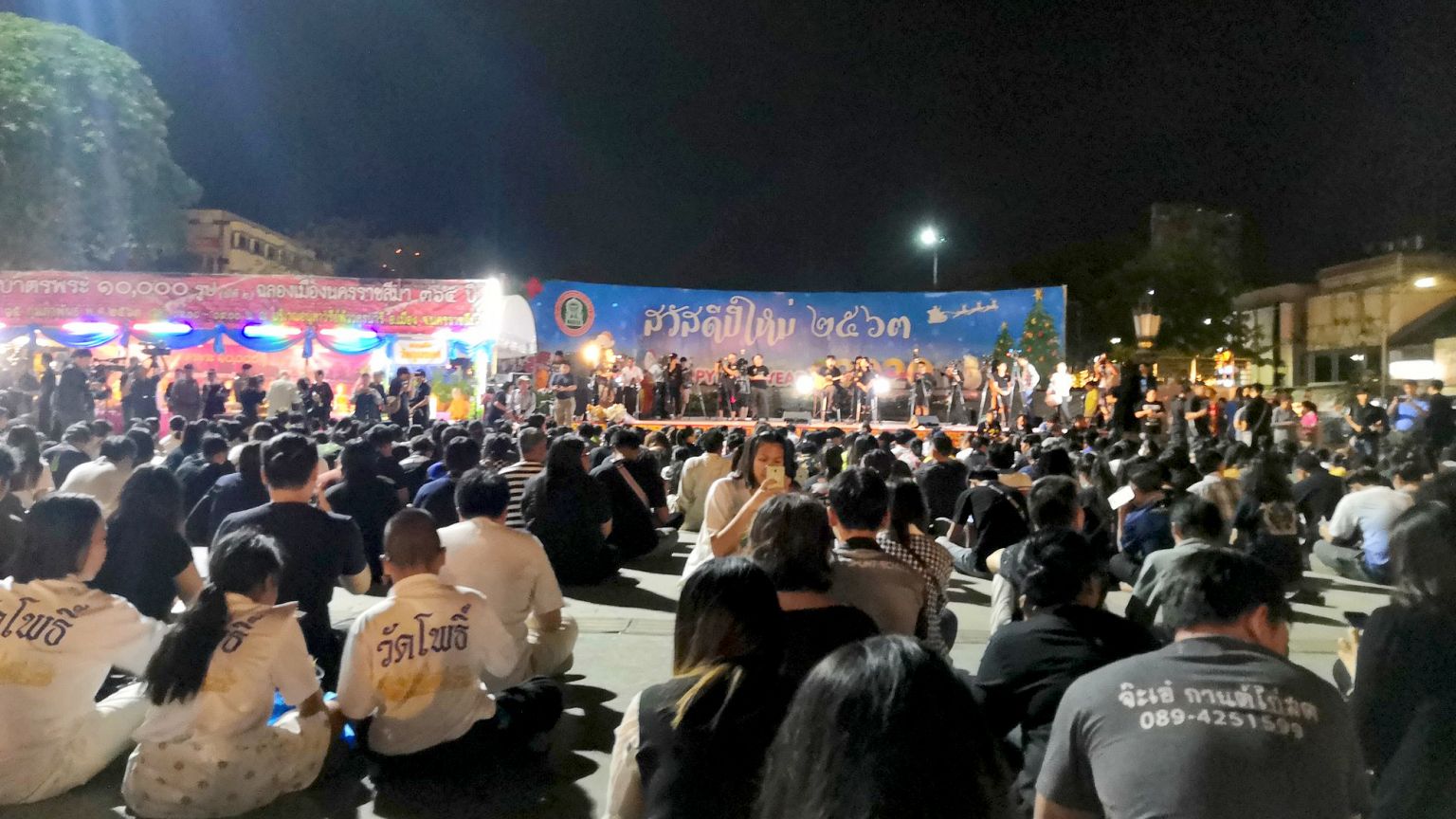 Image: Mourners attended a vigil for the victims of the shooting at the Tha