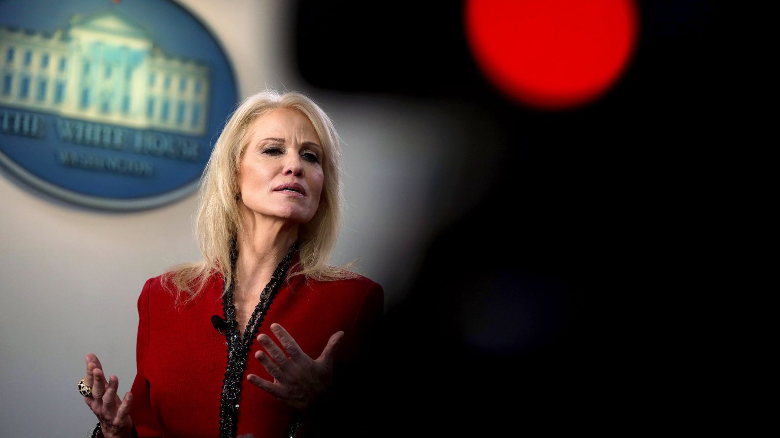 Image: White House senior counselor Kellyanne Conway speaks to the media in