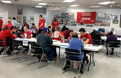 Union members help register voters and explain the early voting process at the Culinary Workers Union in Las Vegas on Monday, Feb. 17, 2020.