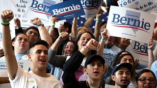 Image: Supporters cheer at a voting rally for Sen. Bernie Sanders, I-VT, in