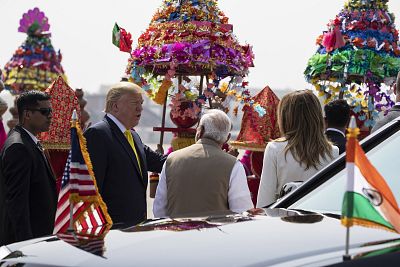 Modi greets the Trumps at Sardar Vallabhbhai Patel International Airport on Monday.