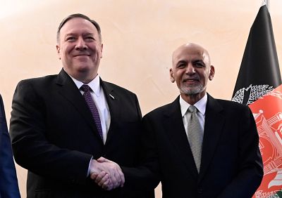 U.S. Secretary of State Mike Pompeo shakes hands with Afghan President Ashraf Ghani in Munich on Feb. 14. 
