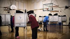 Image: Voters cast ballots on "Super Tuesday" at a polling station in Willi