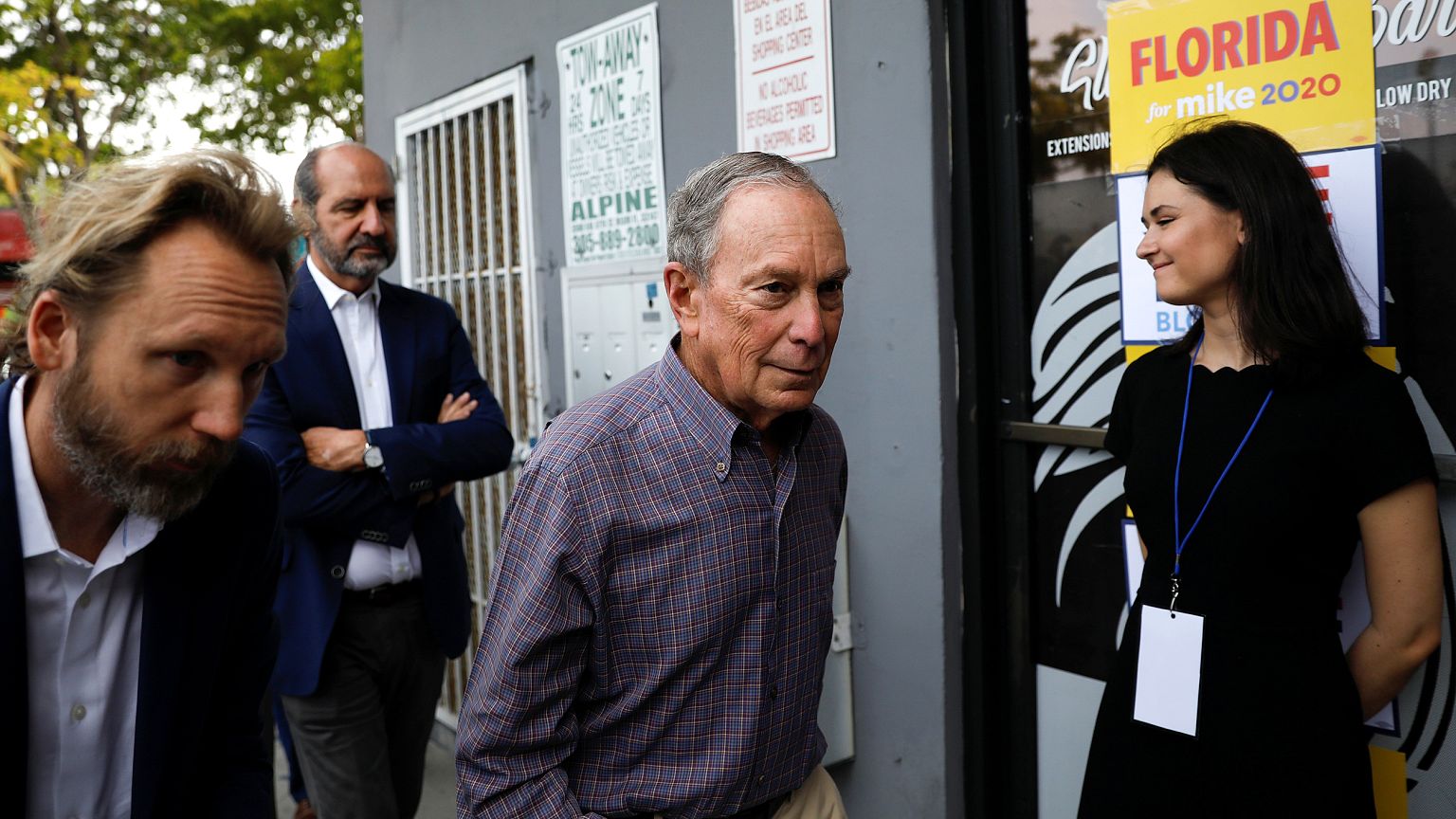 Image: Democratic presidential candidate Michael Bloomberg arrives at his c