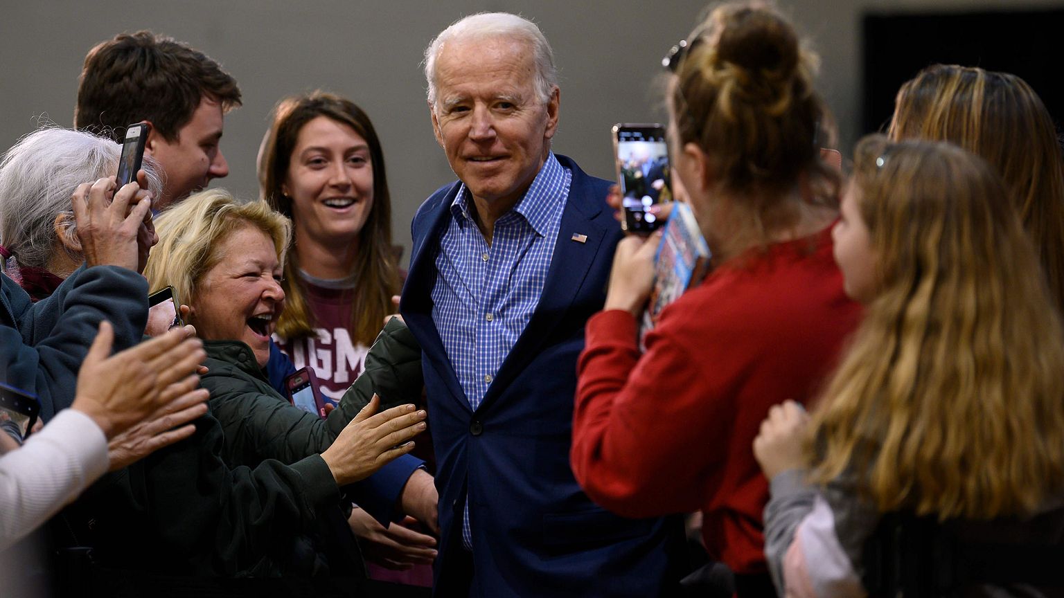Image: Supporters cheer as Democratic presidential hopeful former Vice Pres