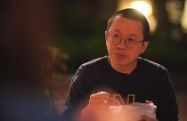 Image: Dr Alfred Wong, eating a takeaway in Hong Kong's Tue Mum Park, where
