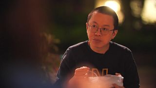 Image: Dr Alfred Wong, eating a takeaway in Hong Kong's Tue Mum Park, where