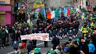 Image: Crowds watch the St. Patrick's Day Parade in Dublin, Ireland, on Mar