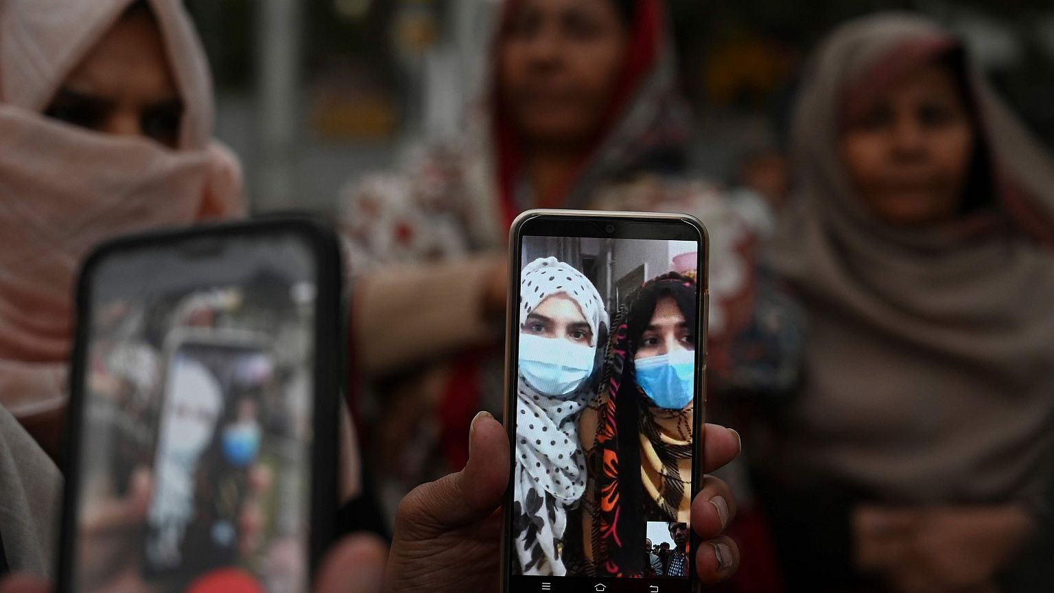 Image: Parents and relatives of Pakistani students in Wuhan