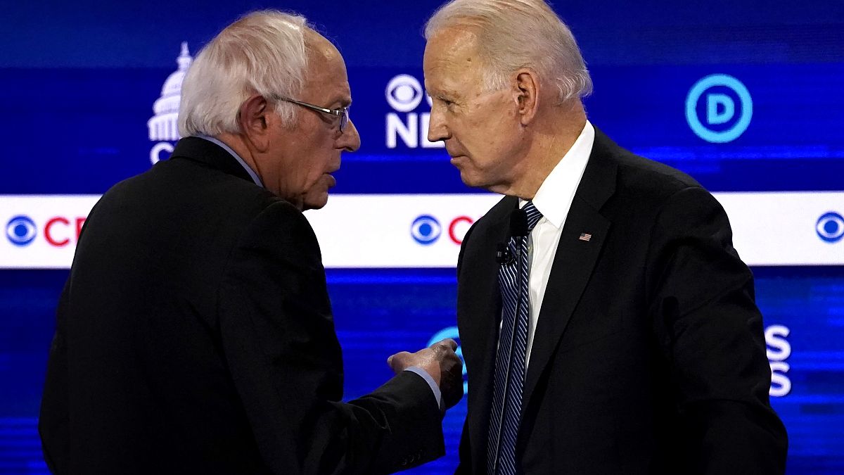 Image: Sen. Bernie Sanders and Joe Biden speak at a Democratic presidential
