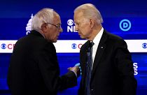Image: Sen. Bernie Sanders and Joe Biden speak at a Democratic presidential