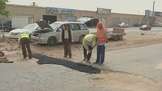 Libya: Misrata residents mobilize to fill 'potholes'