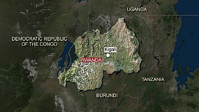 Rwandans dig through mud for victims of deadly mudslides, 18 killed