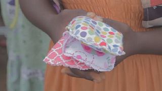 Cameroonian teacher makes re-usable pads to help girls stay in school
