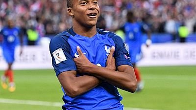Mbappe double helps France beat Argentina 4-3