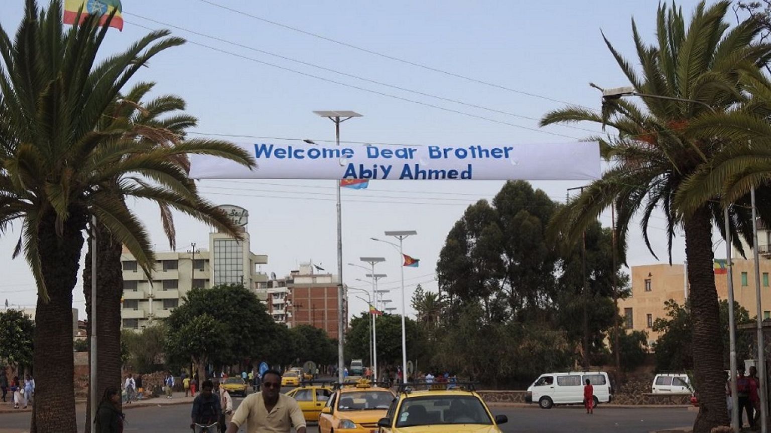 Eritrea lines up Asmara streets with Ethiopian flags to welcome Abiy