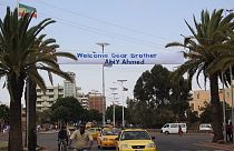 Eritrea lines up Asmara streets with Ethiopian flags to welcome Abiy