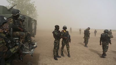 Cameroon arrests four soldiers in connection with execution of women and children