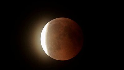 Africans watch 'blood moon' in longest lunar eclipse of 21st century