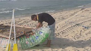 Palestinian fisherman makes environmentally-friendly boats from plastics
