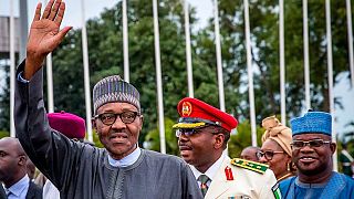 Buhari returns from U.K. vacation, promises to jail treasury looters