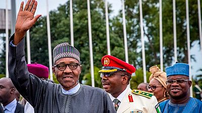 Buhari returns from U.K. vacation, promises to jail treasury looters